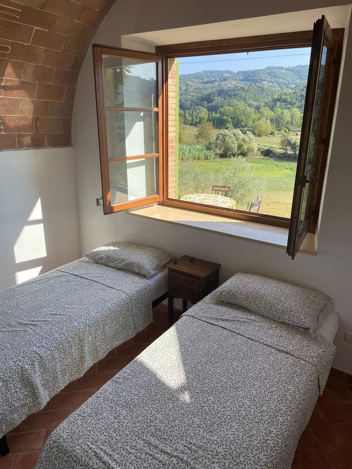 A double bedroom at Casa Brunelli with vaulted stone ceilings